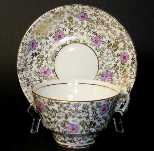 Phoenix Gilt Teacup and Saucer Thomas Forester