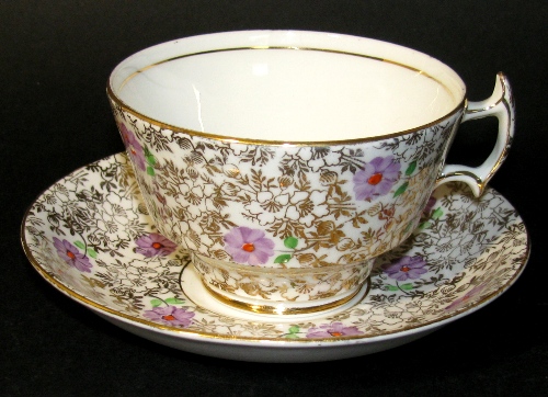 Phoenix Gilt Teacup and Saucer