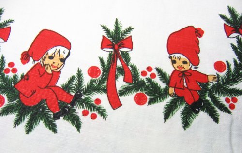 Two pixies on Vintage Christmas Tablecloth