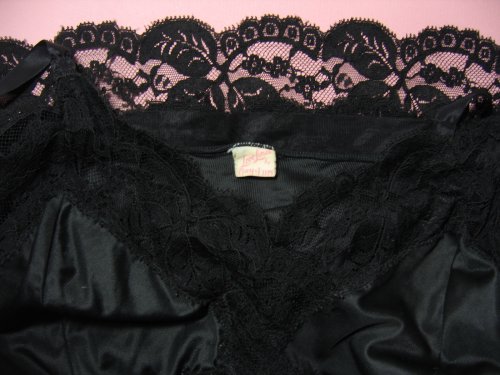 Gay-Lure Label Tag on Black Lace